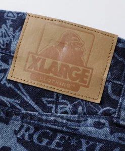 DISCHARGE PRINT DENIM PANTS