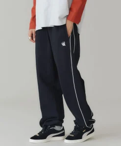 EMBROIDERED LOGO PIPING SWEATPANTS