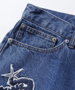 PATCHED DENIM PANTS